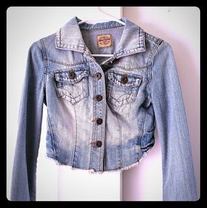 Distressed short denim jacket